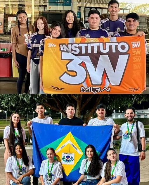 Estudantes atletas com a bandeira do Instituto 3W e a bandeira do município.